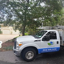 Years of algae safely removed by our house washing service in the Ocean Breeze neighborhood, Amelia Island, FL